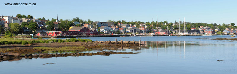 Lunenburg harbour and waterfront with the Fisheries Museum of the Atlantic and Bluenose II in the background.